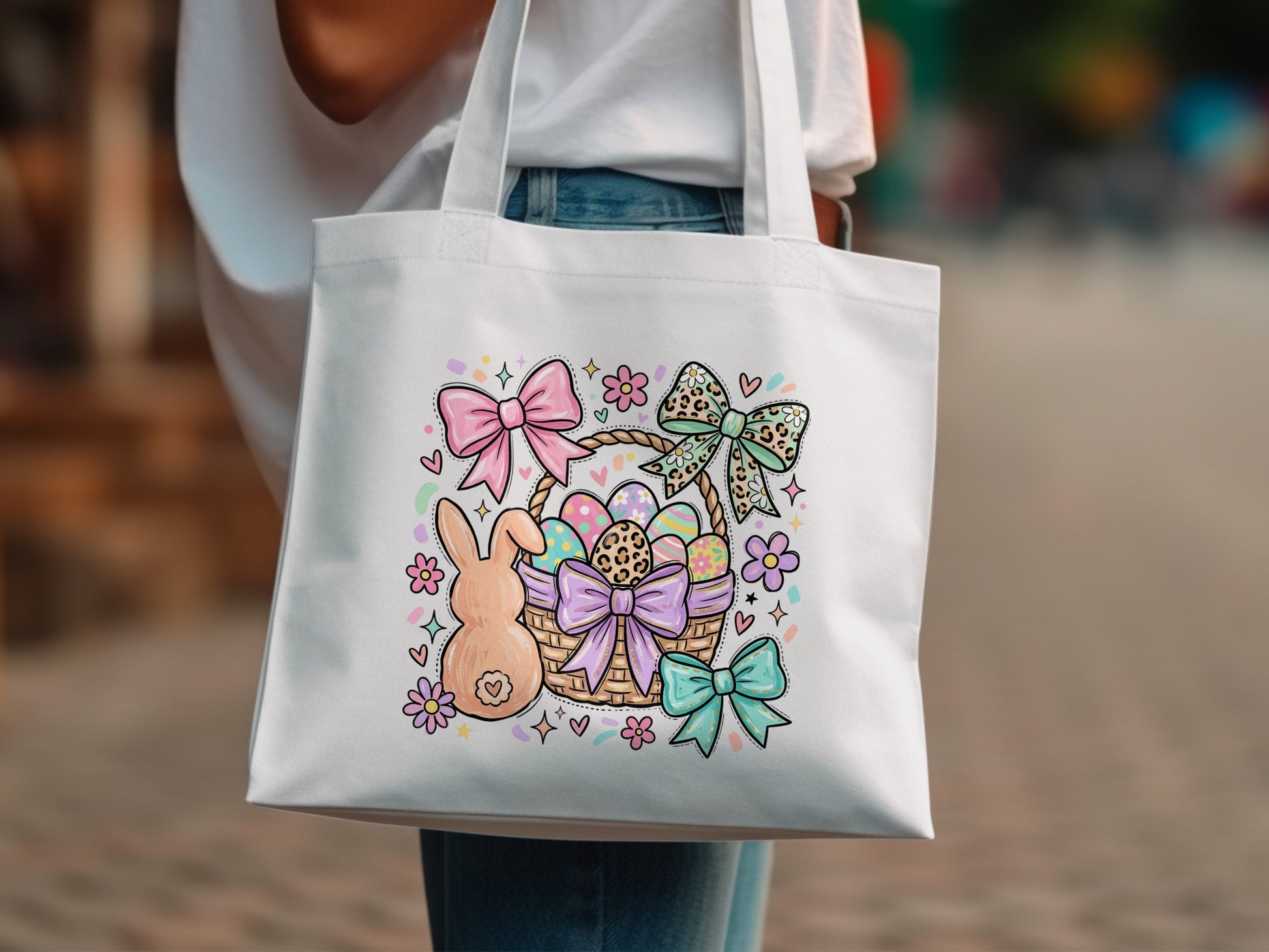 Easter basket with bunny, eggs, and colorful bows, printed on white tote bag.
