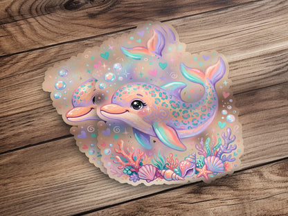 Two colorful cartoon dolphins swim among seashells and coral with bubbles.