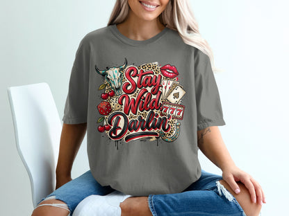 T-shirt with "Stay Wild Darlin'" text, bull skull, cherries, dice, and cards.