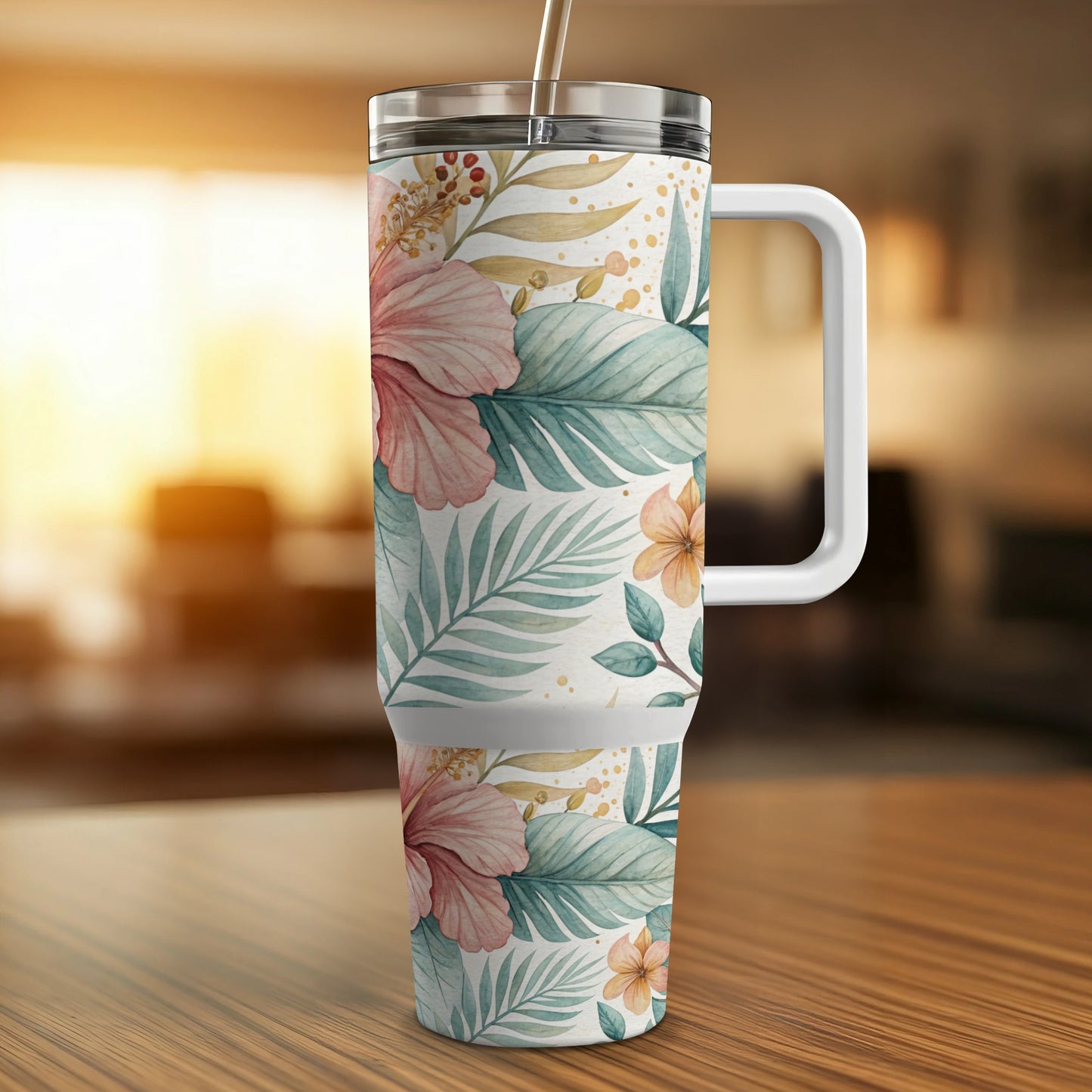 Floral pattern tumbler with handle on wooden table.