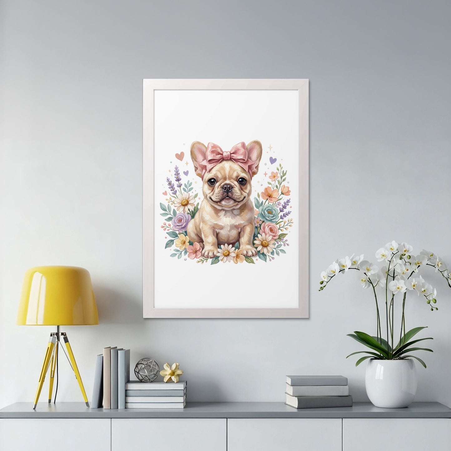 Framed artwork of a French bulldog puppy with a pink bow and flowers.