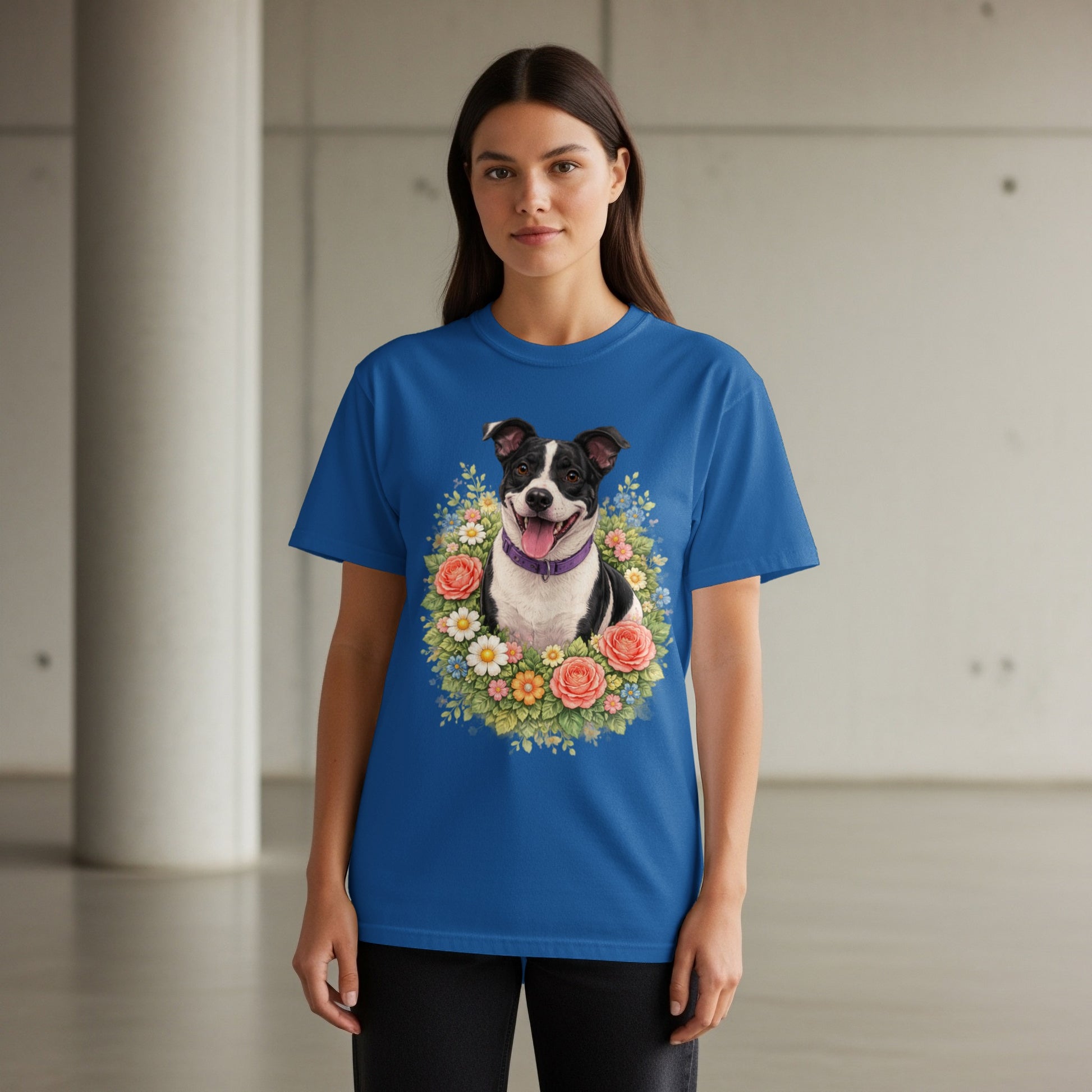 Blue t-shirt featuring a dog portrait surrounded by flowers.