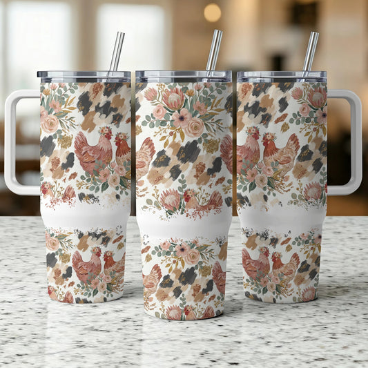 Floral chicken pattern on three white tumblers with handles and straws.