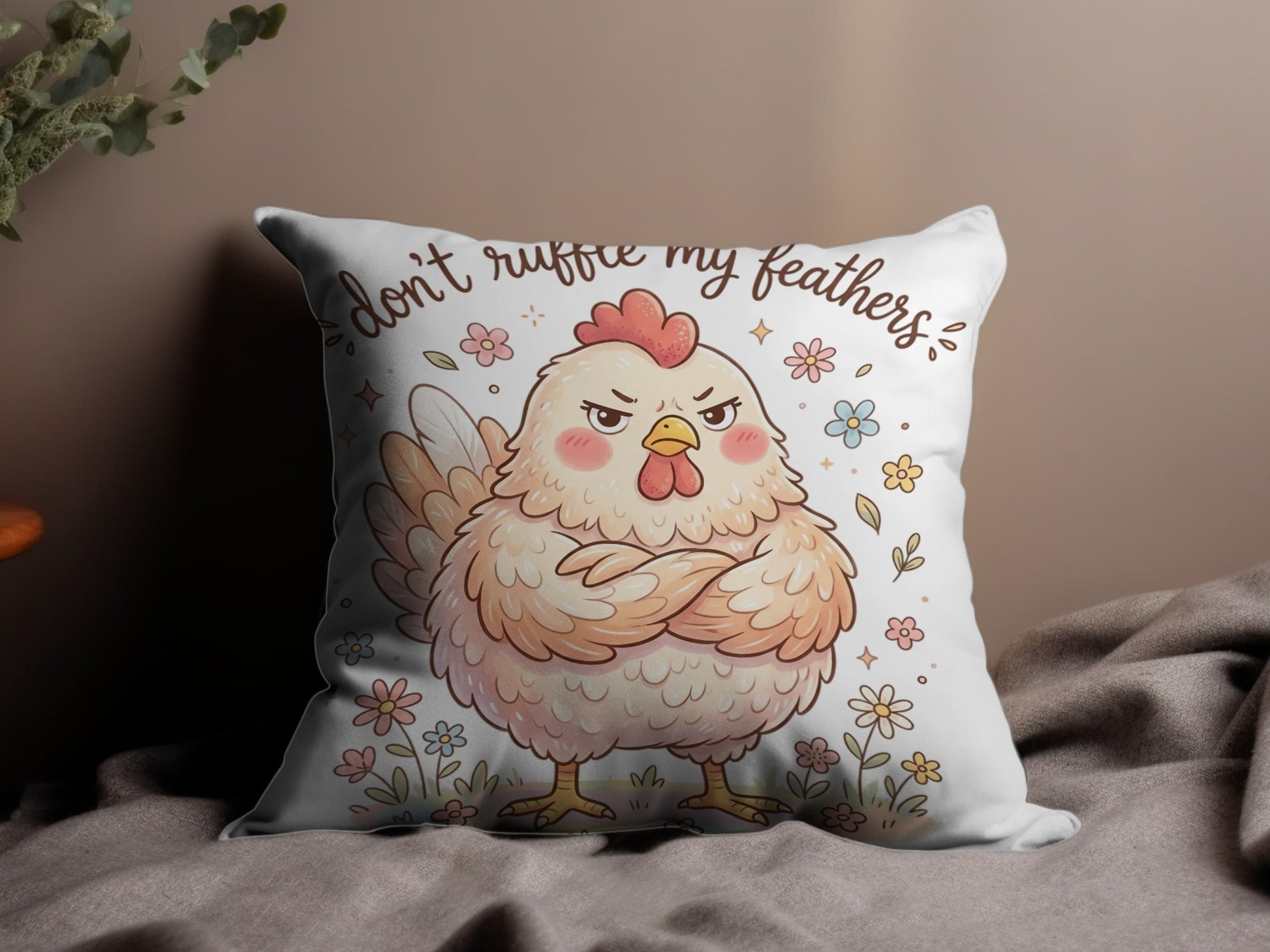 Frowning cartoon chicken with crossed arms and "don't ruffle my feathers" text.