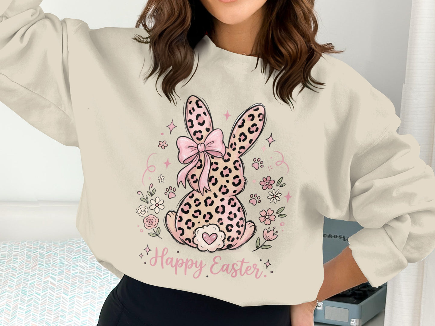 Cream sweatshirt with a pink leopard print Easter bunny and flowers.