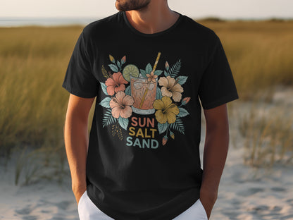 Black t-shirt with a colorful floral and drink design featuring "SUN SALT SAND" text.