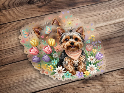 Yorkshire terrier dog with tulips and butterflies, wearing a pink bandana.