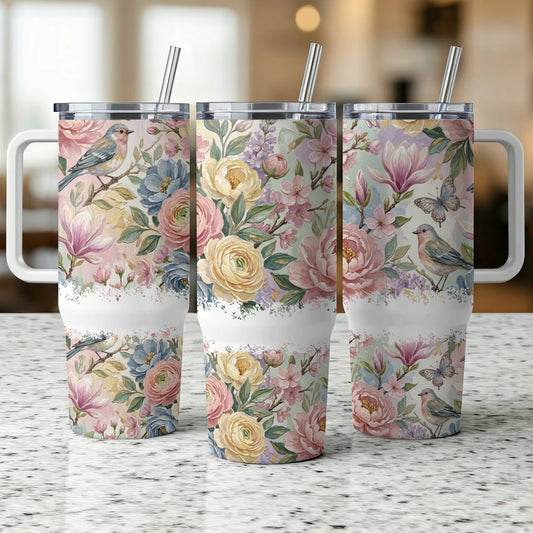 Three tumblers with floral and bird designs and white text panels.