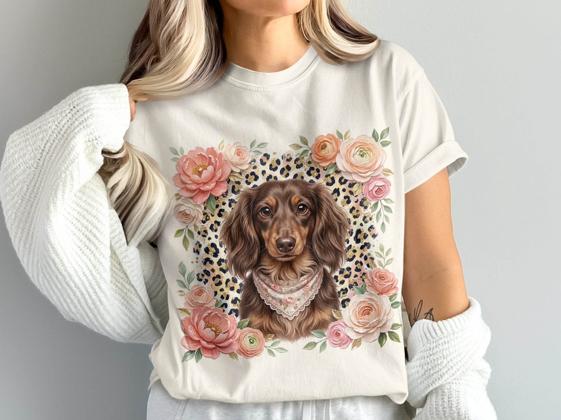 Cream t-shirt with dachshund portrait, floral accents, and leopard print bandana.