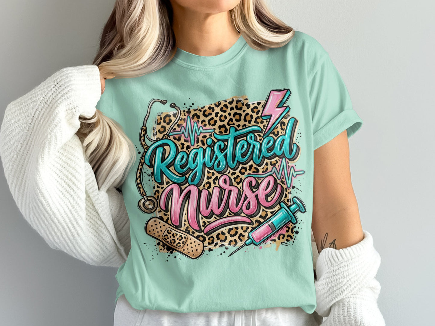 Mint t-shirt with "Registered Nurse" text, stethoscope, syringe, and leopard print.