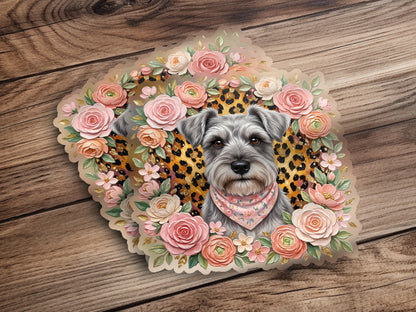 Schnauzer portrait surrounded by pink and peach roses and leopard print.