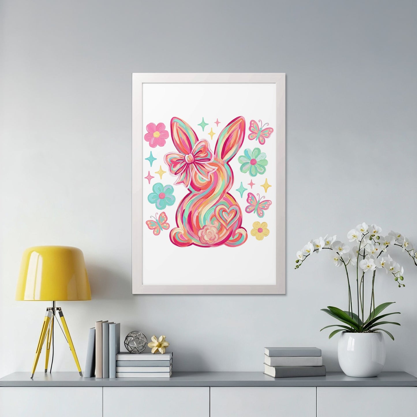 Colorful abstract Easter bunny with flowers and butterflies in a white frame.