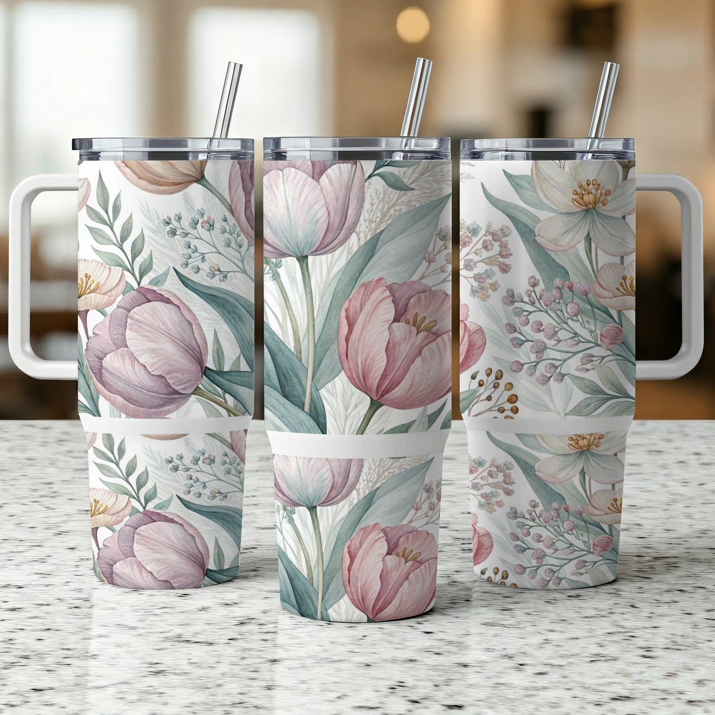 Three tumblers with a floral design of pink tulips and greenery.