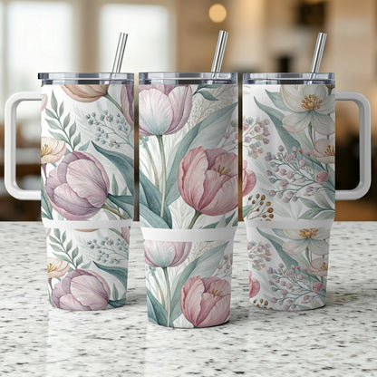 Three tumblers with a floral design of pink tulips and greenery.