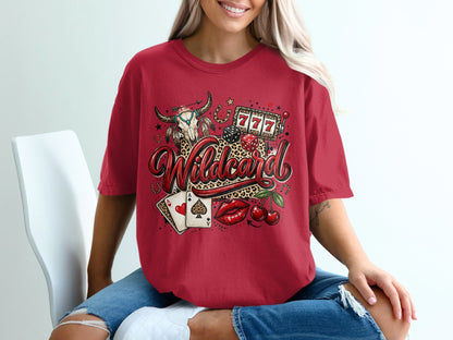 Red t-shirt with cow skull, playing cards, cherries, and dice graphic.