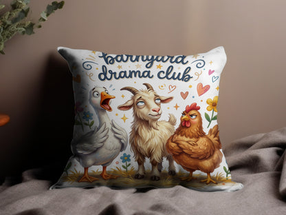 Barnyard Drama Club pillow with duck, goat, and chicken.
