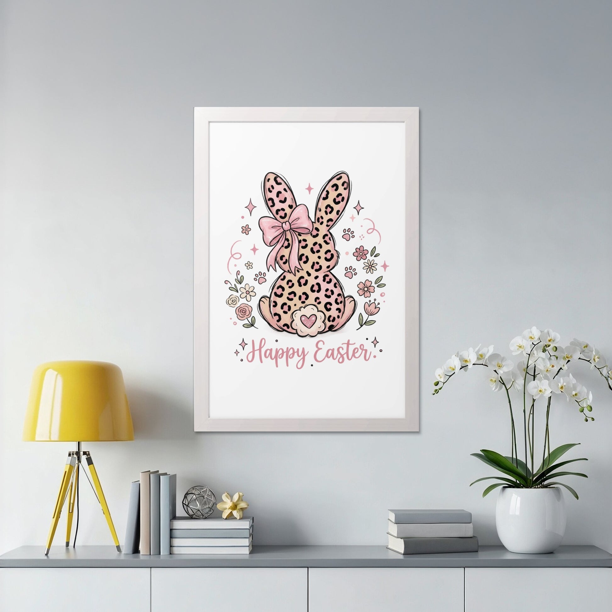Pink leopard print bunny with "Happy Easter" text surrounded by flowers.