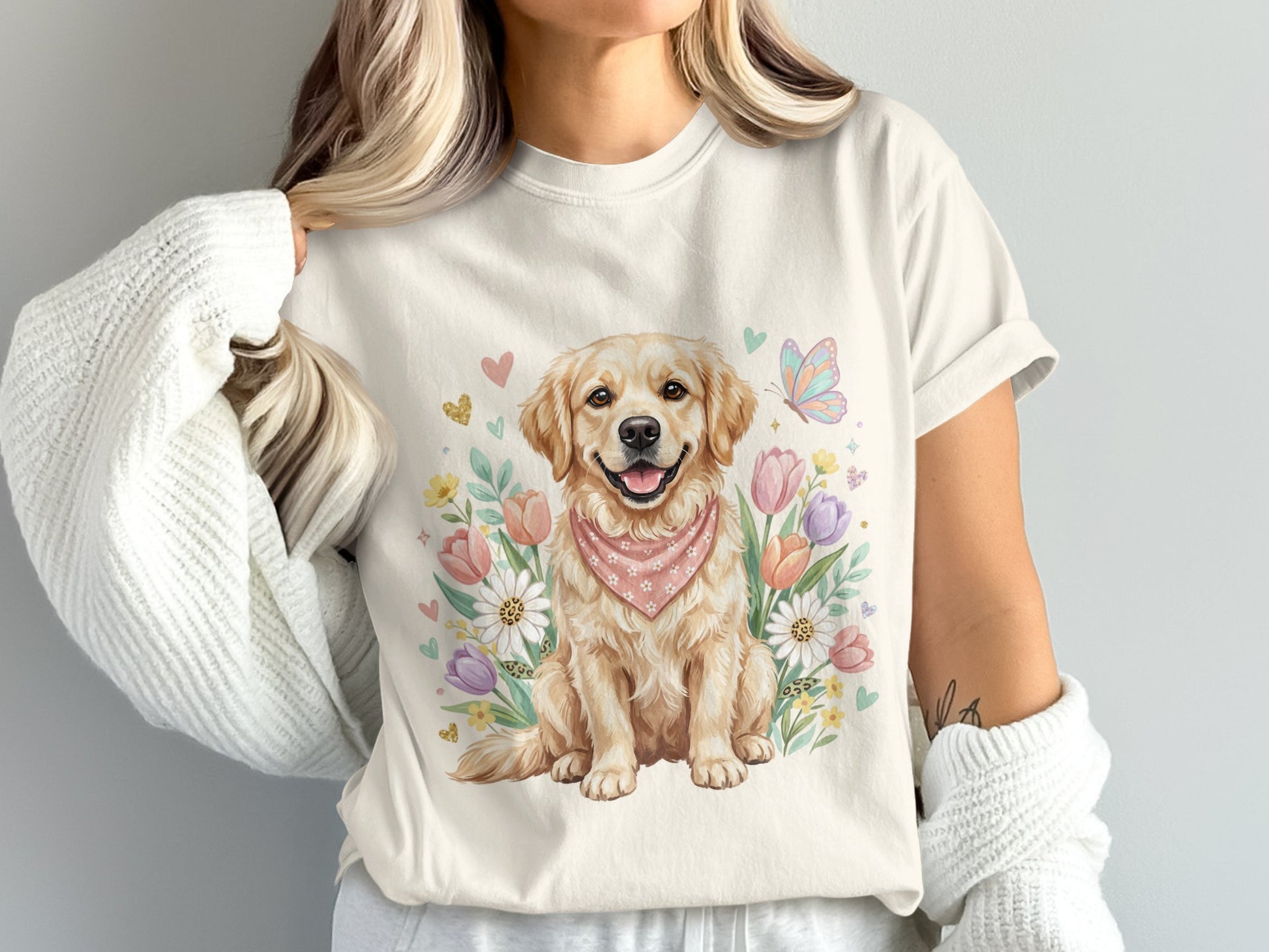 Golden retriever wearing pink bandana sits amongst colorful flowers and butterflies.