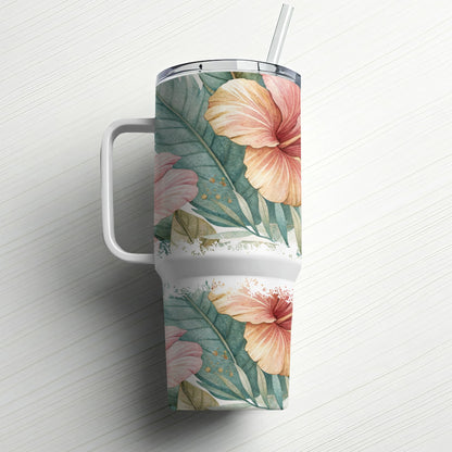 Tropical hibiscus floral pattern on a white insulated tumbler with straw.