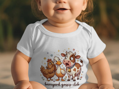 Baby wearing a white bodysuit with cartoon cow, chicken, and duck saying "Barnyard gossip club."