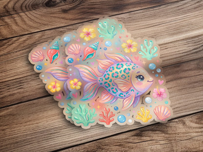Whimsical cartoon fish with coral, seashells, and bubbles on a wooden background.