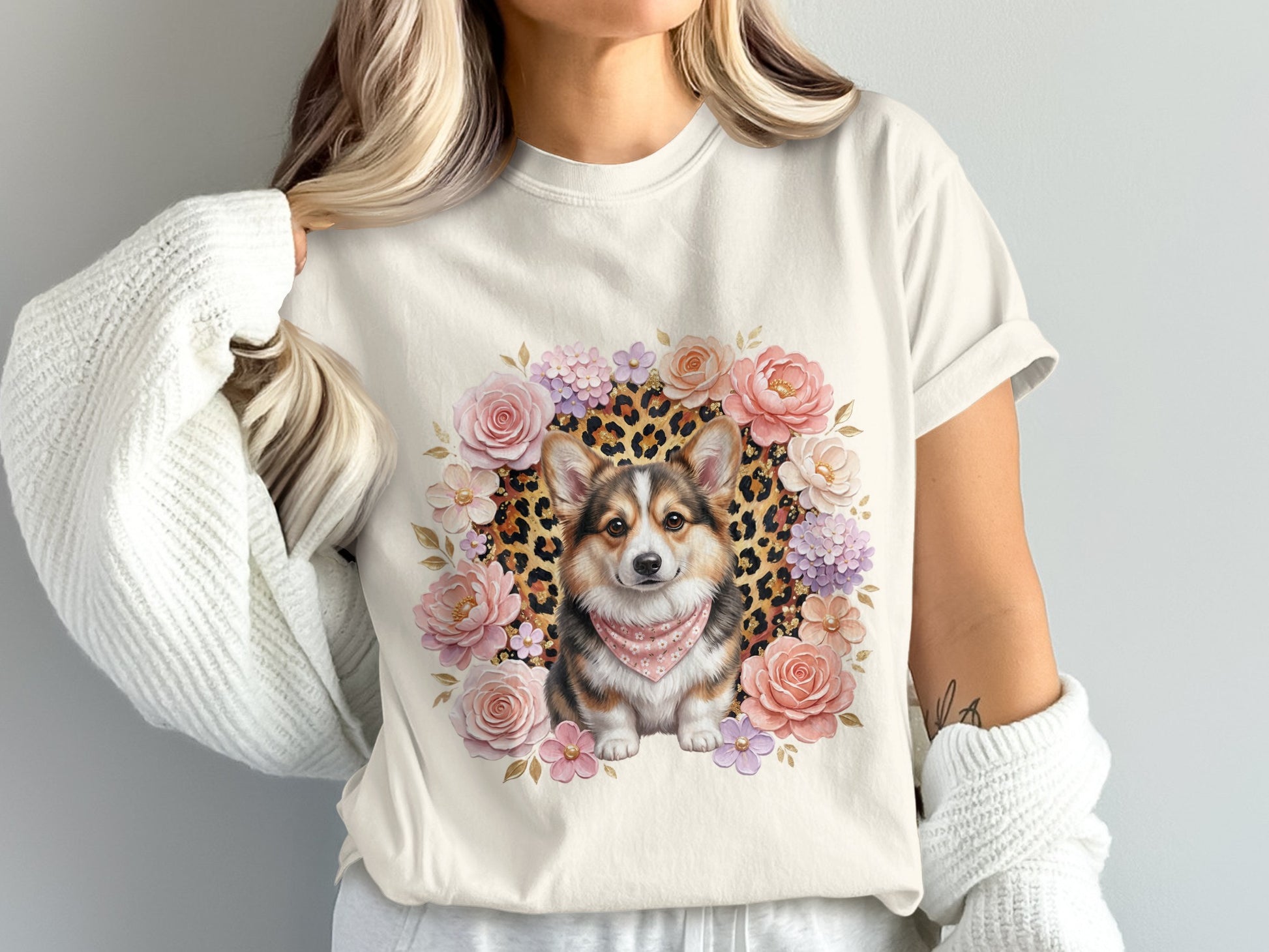 White t-shirt with a corgi in a floral and leopard print frame.