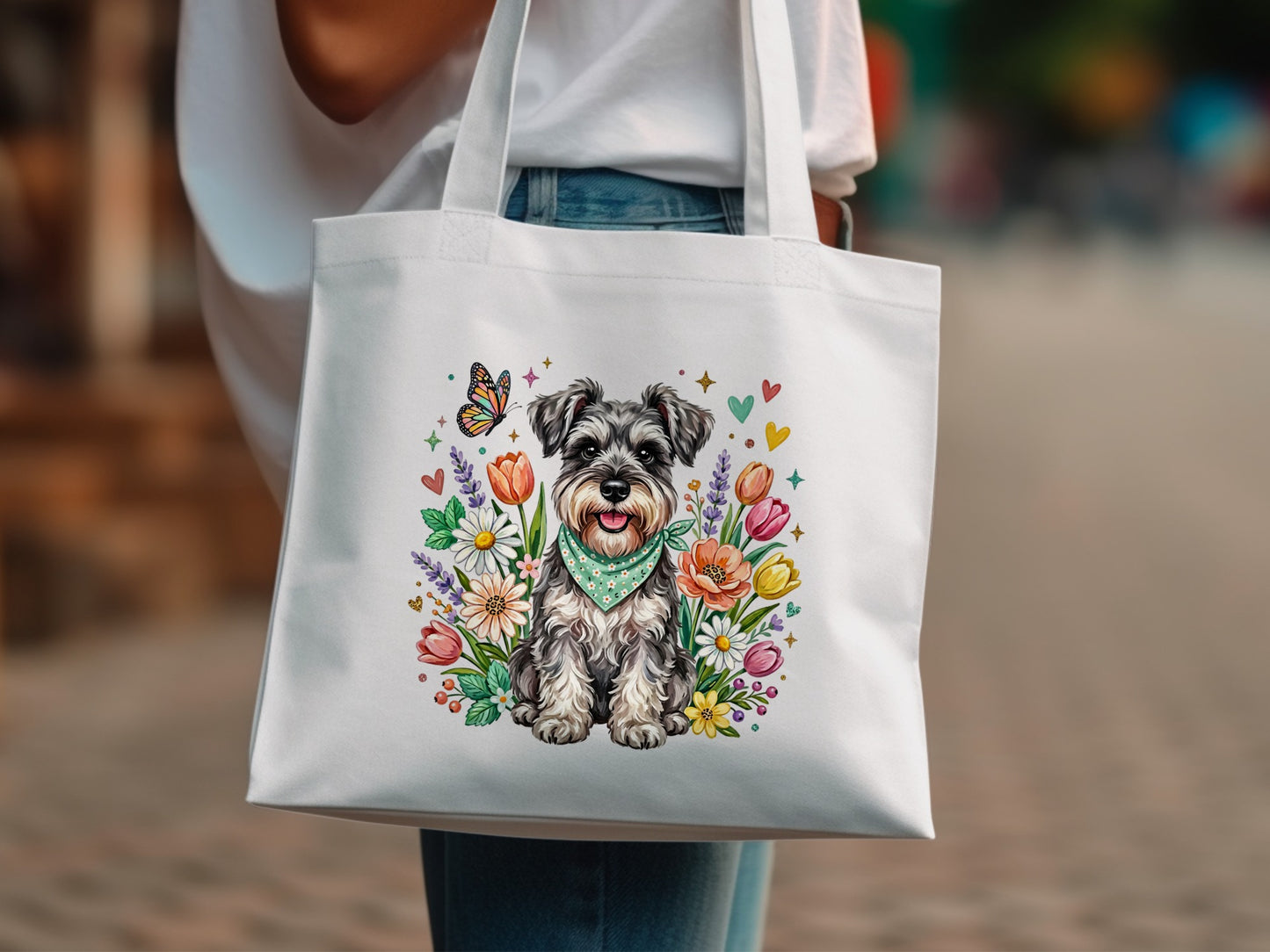 White tote bag with a Miniature Schnauzer surrounded by colorful flowers and a butterfly.