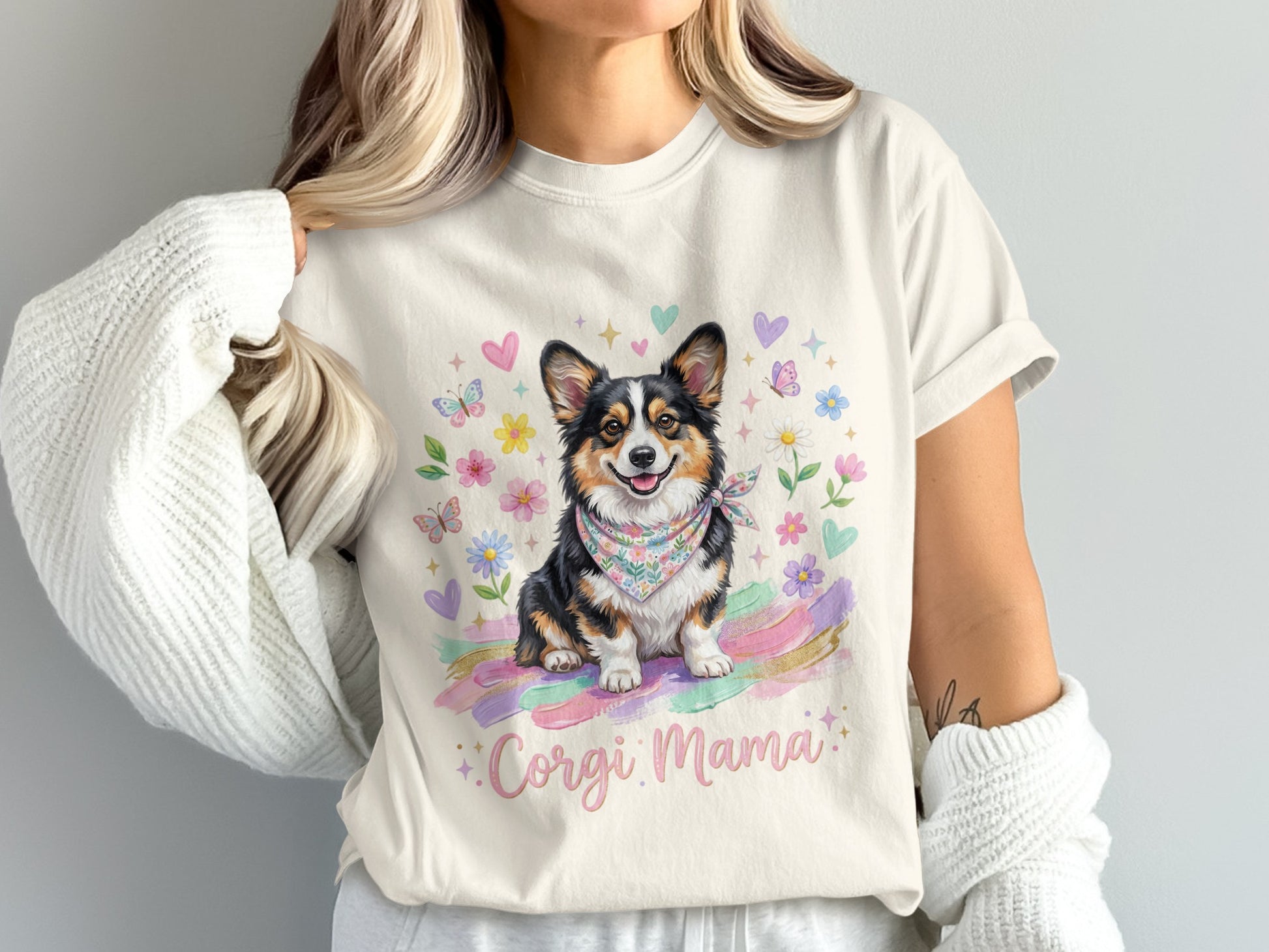 Corgi Mama t-shirt with a cheerful Corgi dog, hearts, and flowers.