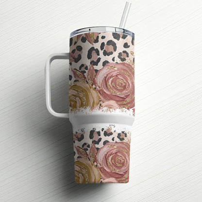 Floral and leopard print tumbler with handle and straw.