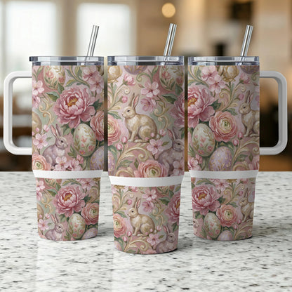 Three Easter-themed tumblers with bunnies, eggs, and floral patterns.