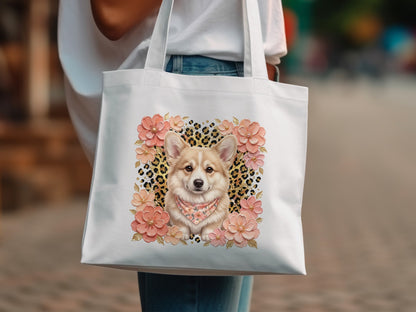White tote bag with corgi wearing bandana and floral border.