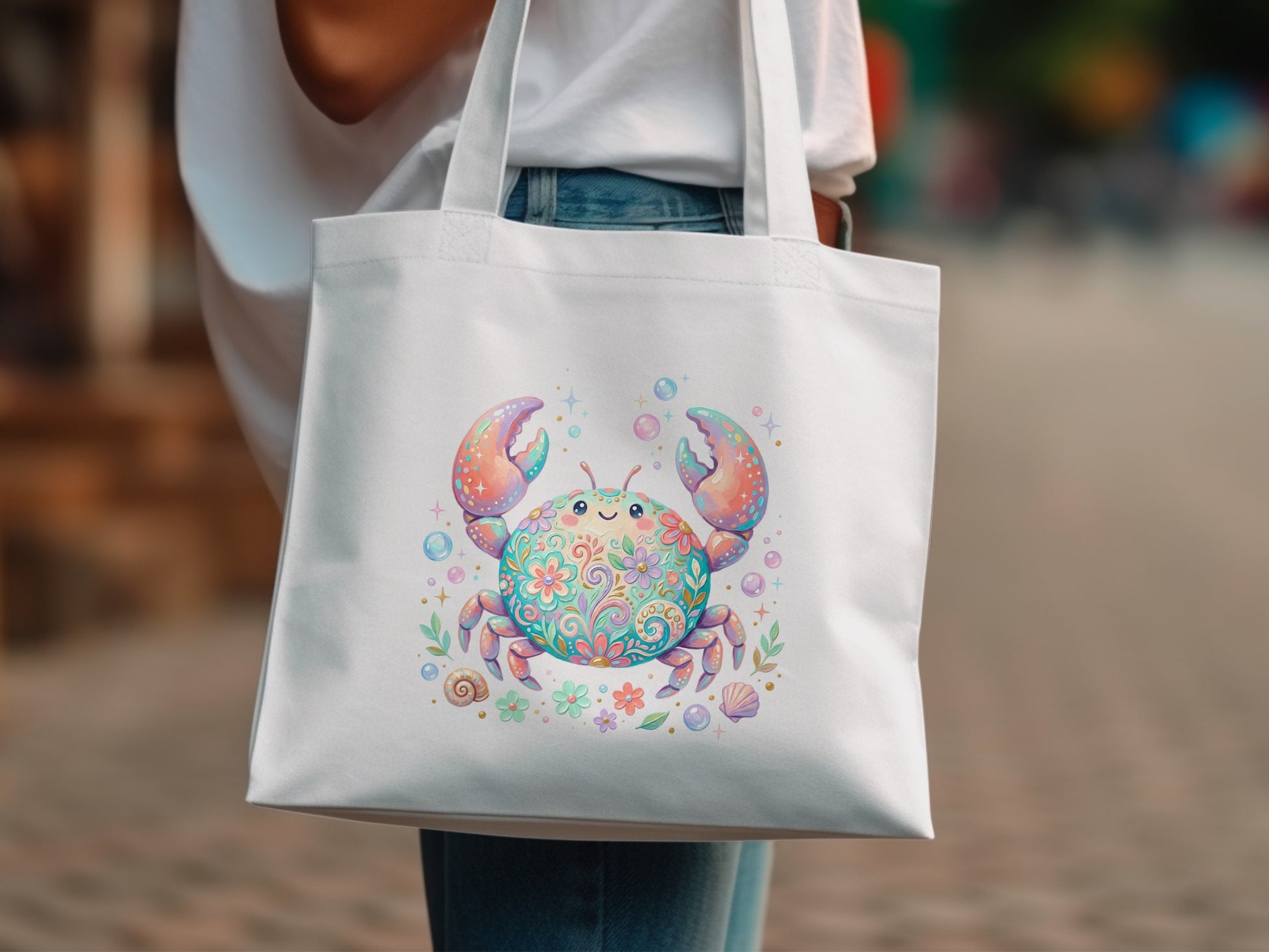 White tote bag with a colorful cartoon crab and floral accents.