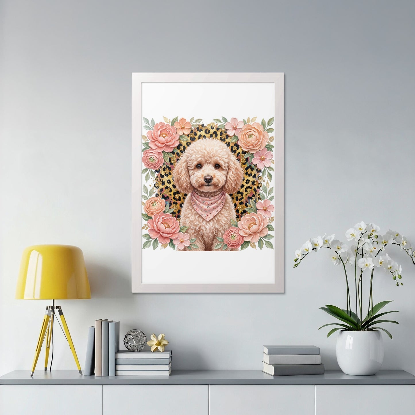 Poodle wearing a bandana surrounded by flowers in a white frame.