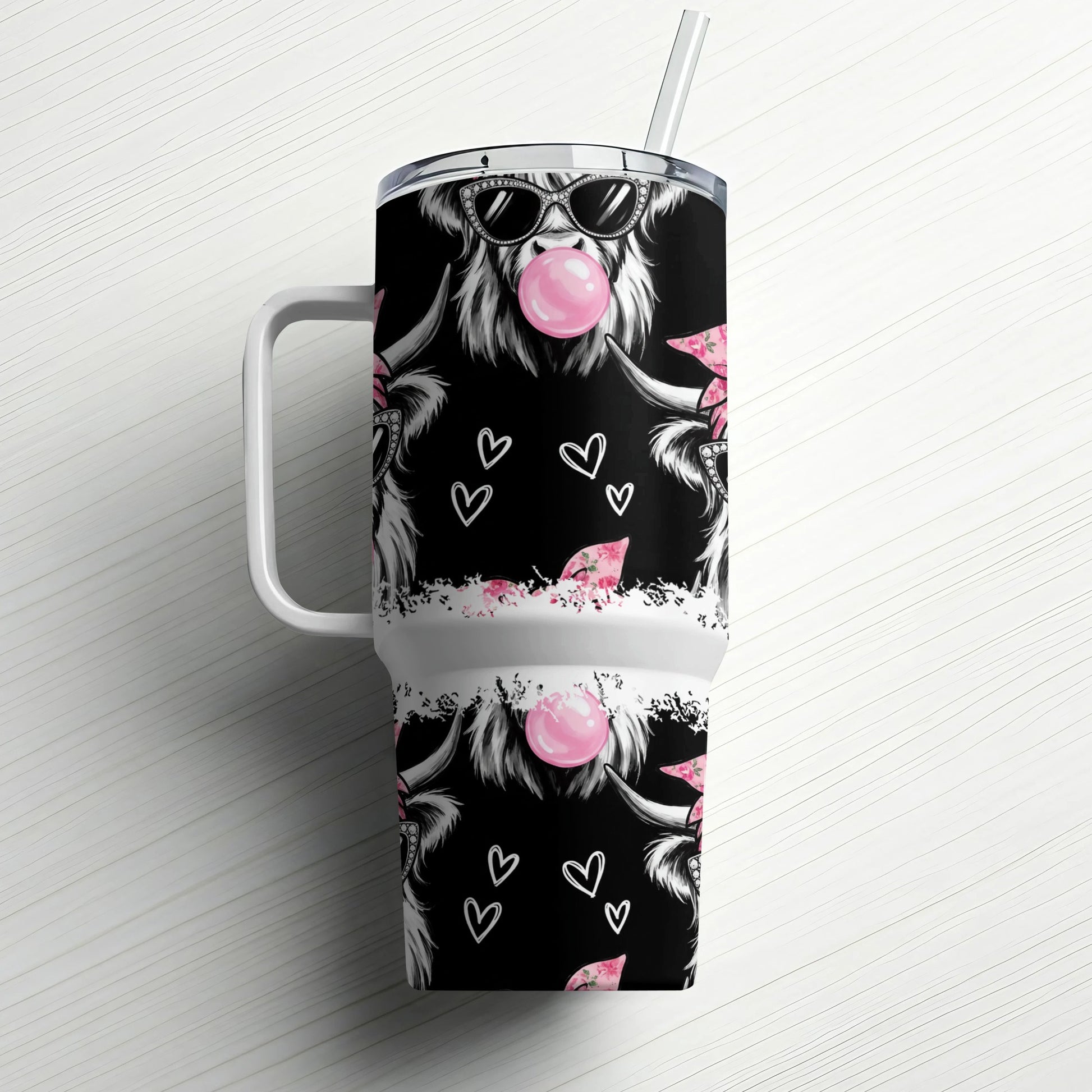 Pink-lipped cow wearing sunglasses and blowing bubblegum on tumbler.