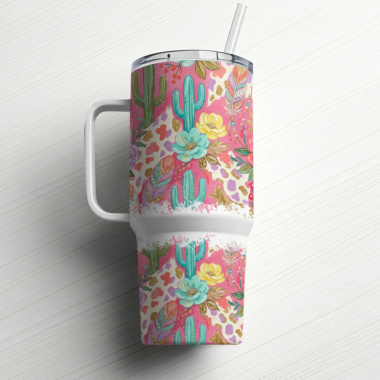 Floral cactus print tumbler with straw and handle.