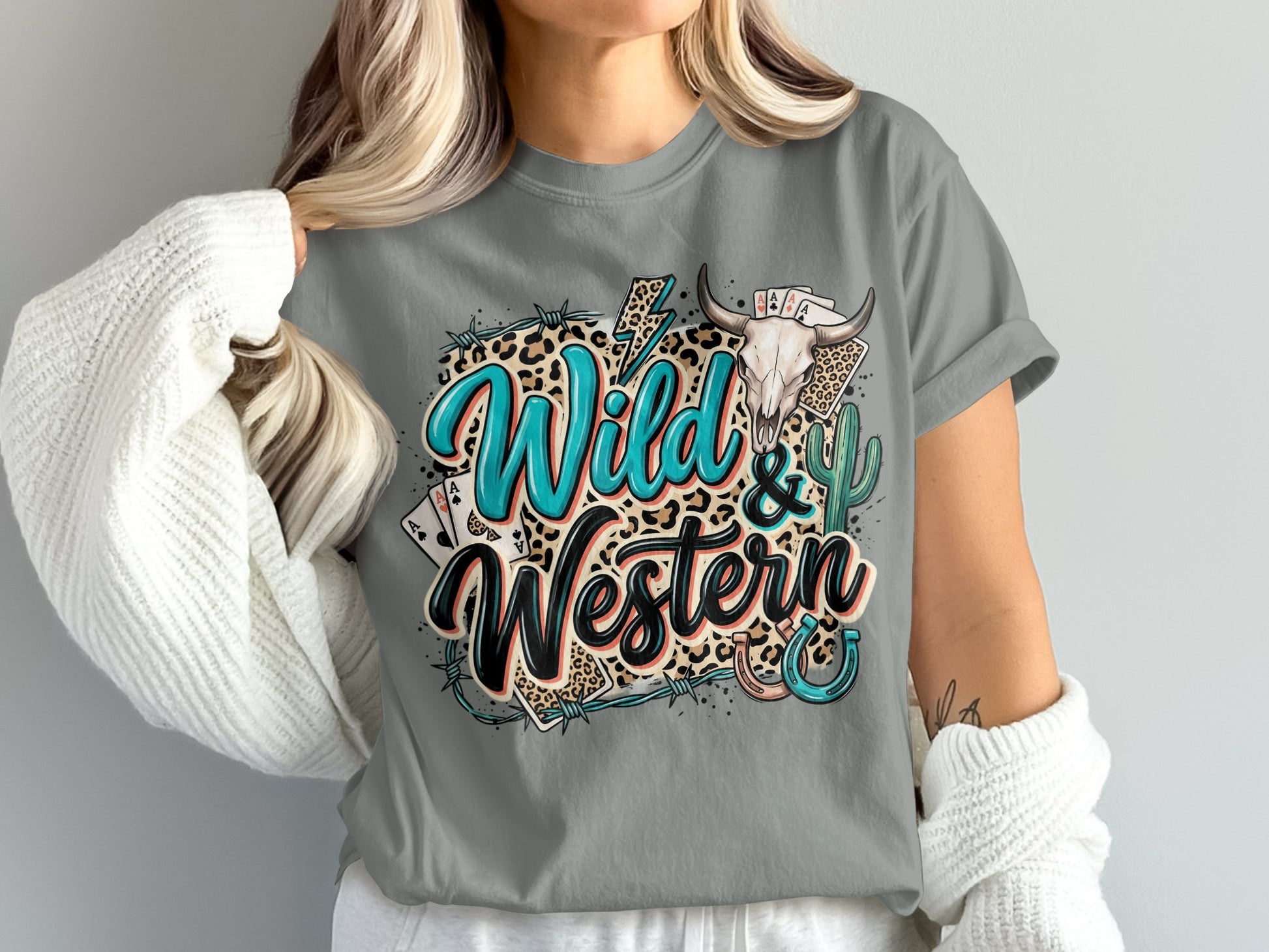 T-shirt with "Wild & Western" text, skull, cards, and horseshoe design.