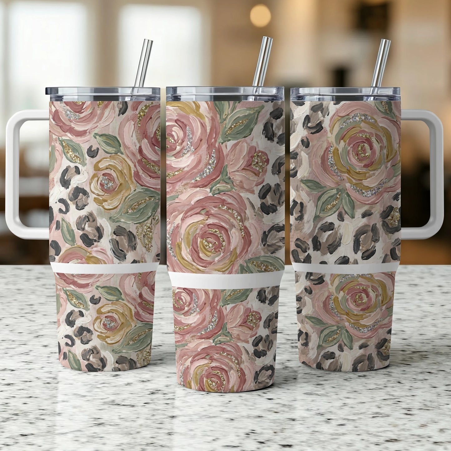 Floral and leopard print insulated tumblers with handles and straws.