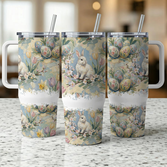 Easter bunny and eggs on pastel floral patterned tumbler with straws.