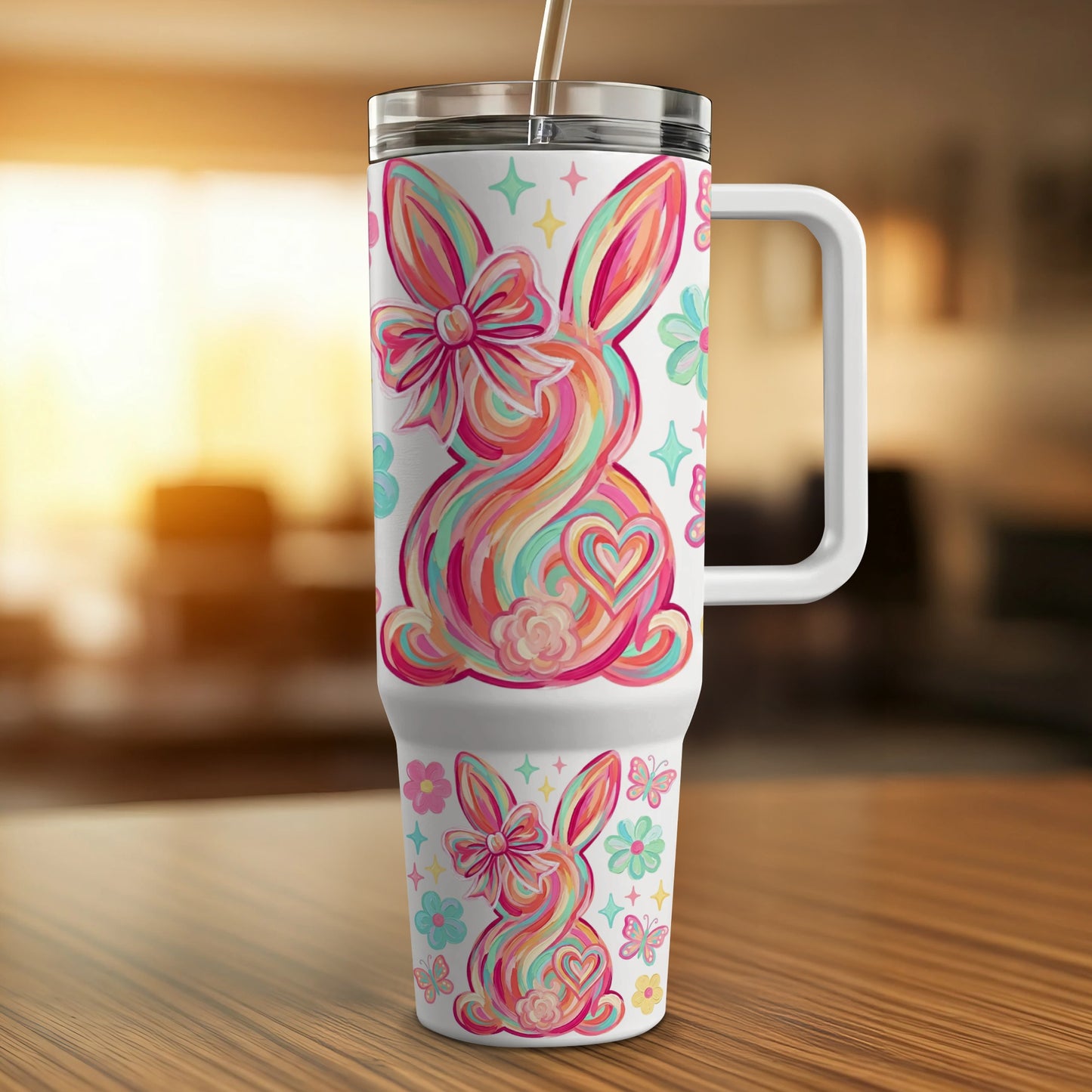 Colorful striped Easter bunny with bow and flowers on a white travel tumbler.