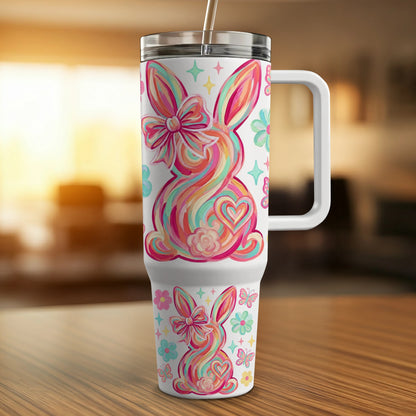 Colorful striped Easter bunny with bow and flowers on a white travel tumbler.