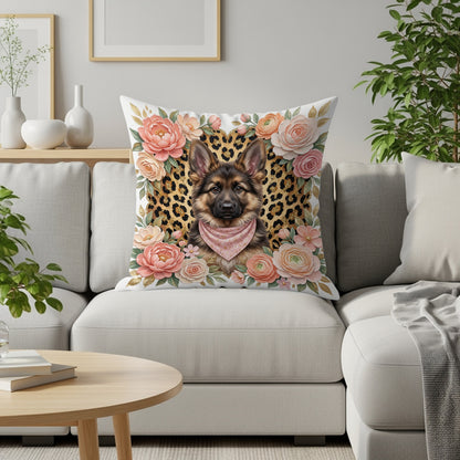 German Shepherd wearing pink bandana on leopard print pillow.