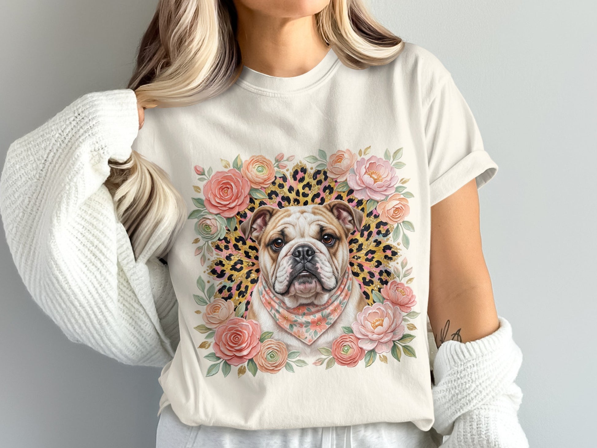 Bulldog portrait surrounded by flowers and leopard print on a cream t-shirt.