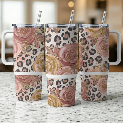 Three tumblers with rose and leopard print designs stand side-by-side.