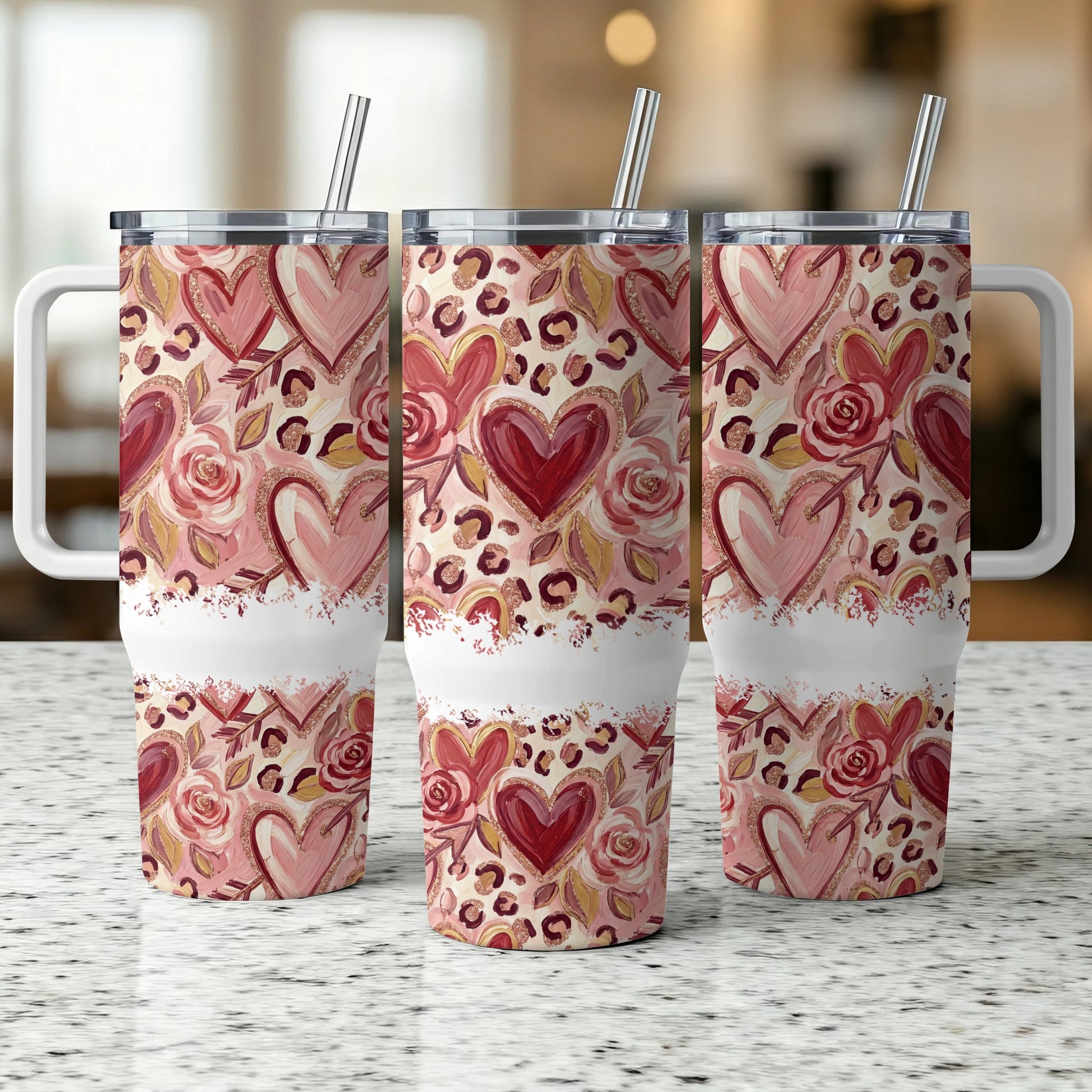 Three tumblers with heart and floral pattern, leopard print accents.