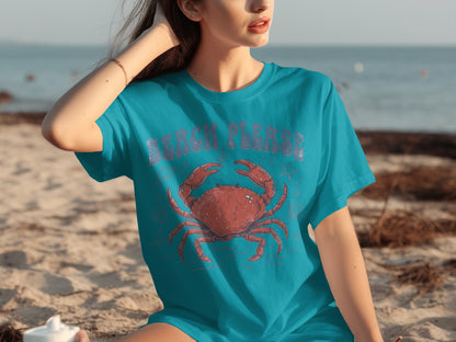 Teal t-shirt with a red crab and "Beach Please" text.