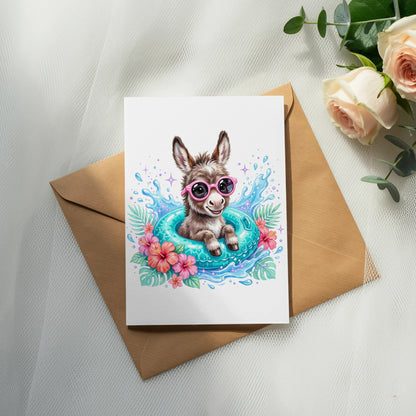 Donkey wearing sunglasses in a pool float with flowers.