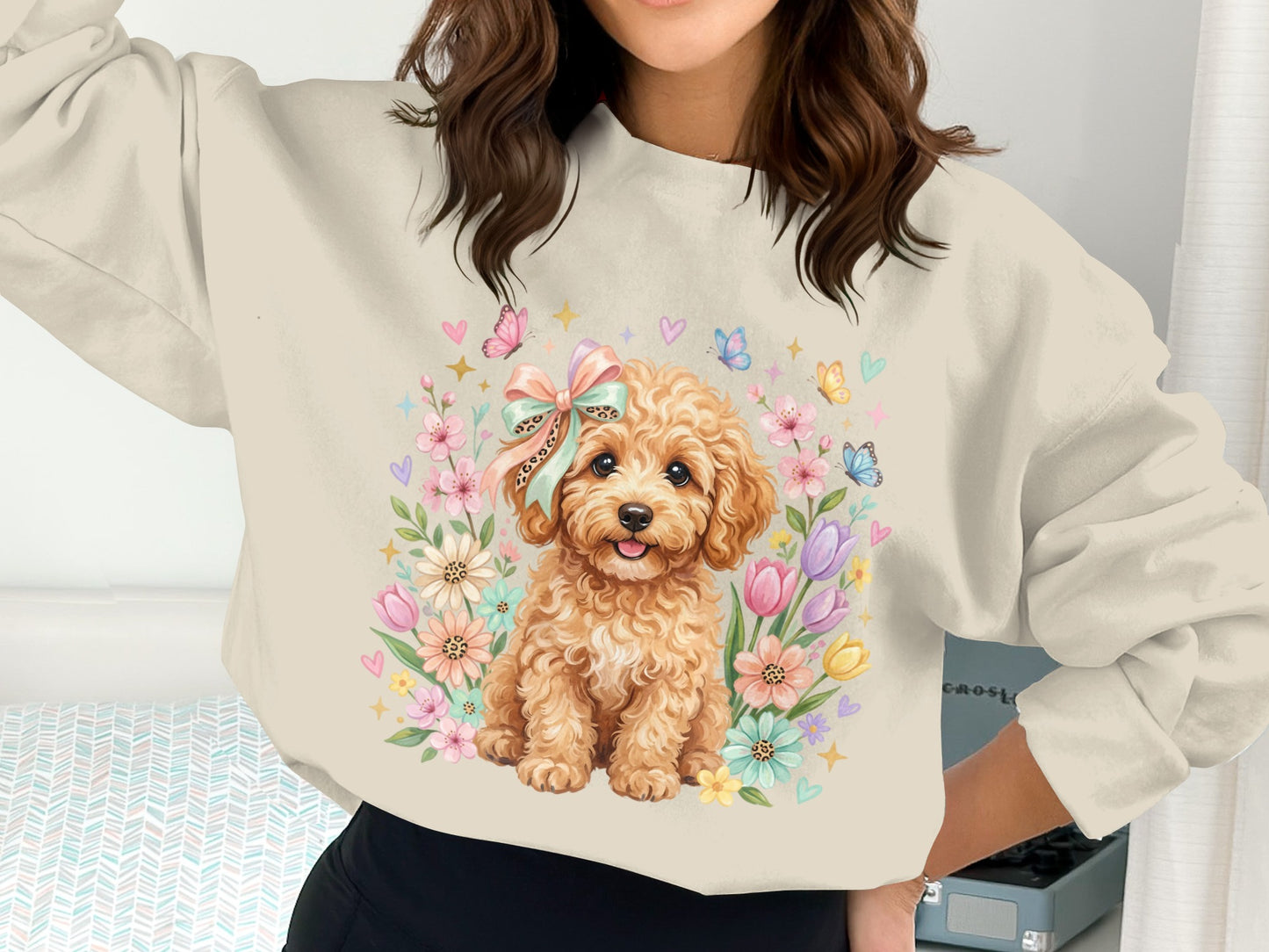Light brown poodle puppy with floral garland and pastel butterflies.