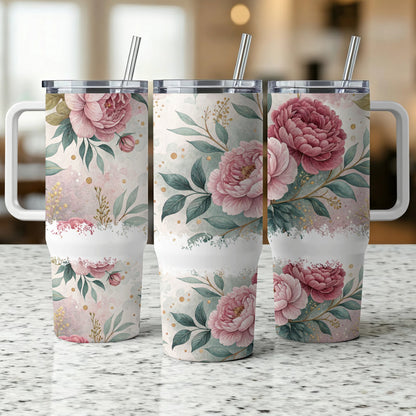 Three tumblers with pink floral and green leaf pattern.