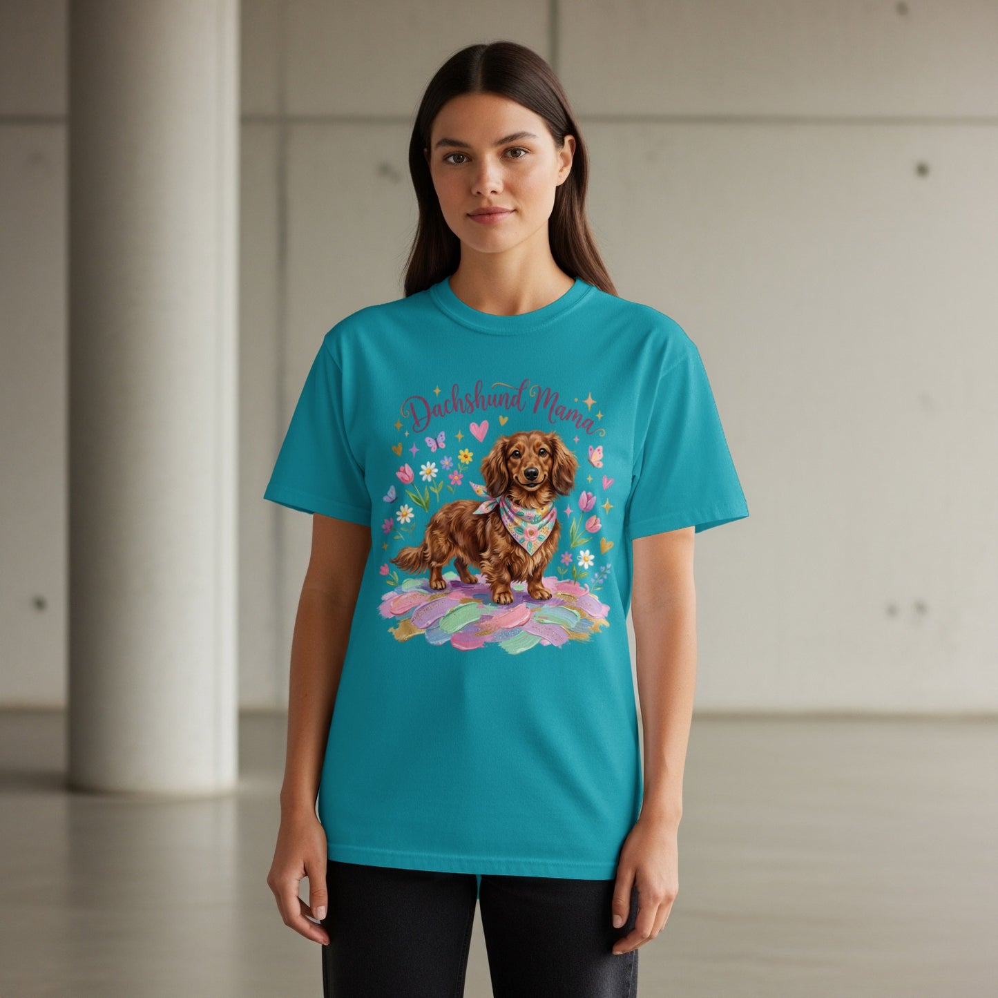 Teal t-shirt with dachshund mom graphic featuring a dog, flowers, and hearts.