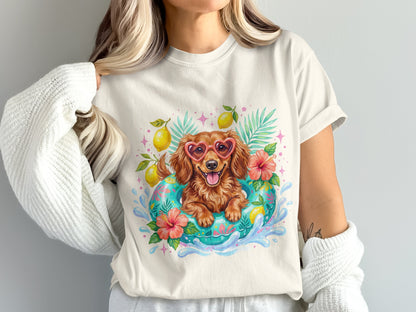 Dachshund wearing heart sunglasses in a pool float with flowers and lemons.